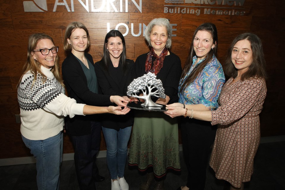 Newmarket Farmers' Market 2024 board Lisa Cooper, Rebecca Alton, Melissa Skelton, Cathy Bartolic, Sylvie Yeghiaian and Katy Bennett hold the trophy for best Farmers Market in Ontario in 2023 at Ray Twinney Recreation Complex Feb. 24.