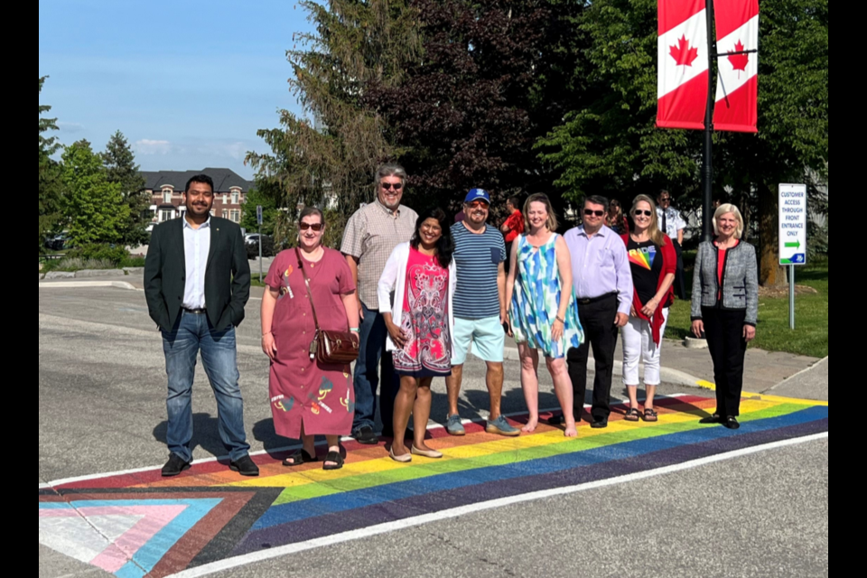 The Town of East Gwillimbury, with Pflag Canada York Region, unveils its Progress Pride crosswalk at the Civic Centre on Leslie Street to mark Pride month.