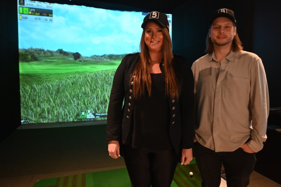 Courtney and Cameron Kearley, along with two other siblings, have opened Bogey Club, a new golf simulator venue in Newmarket. 