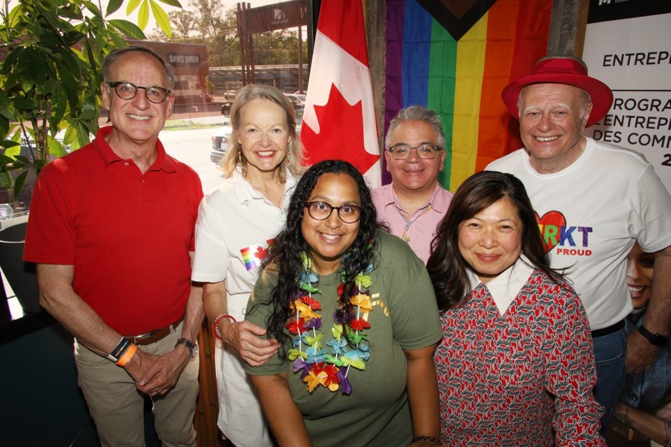 Minister Mary Ng with The Sticks Craft Beer Bar owner Samantha Rickford (front), and Liberal MPs Rob Oliphant, Leah Taylor Roy, Francesco Sorbara and Tony Van Bynen, at a funding announcement for 2SLGBTQIA+ entrepreneurship June 17.