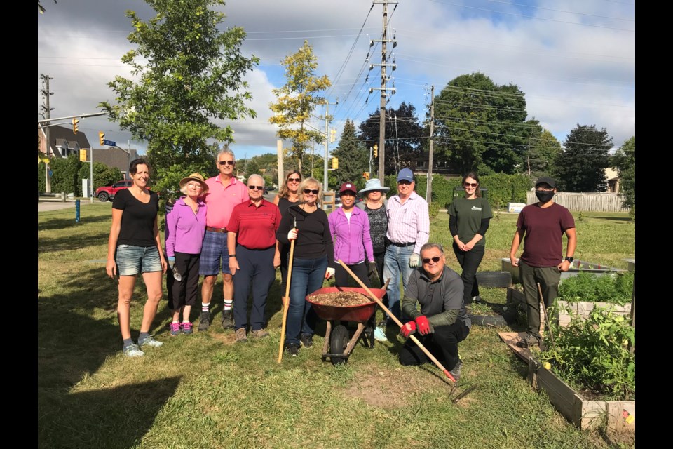 Entrepreneurs in Motion (EIM) volunteers at the London and Main Community Garden in Newmarket Sept. 3. 