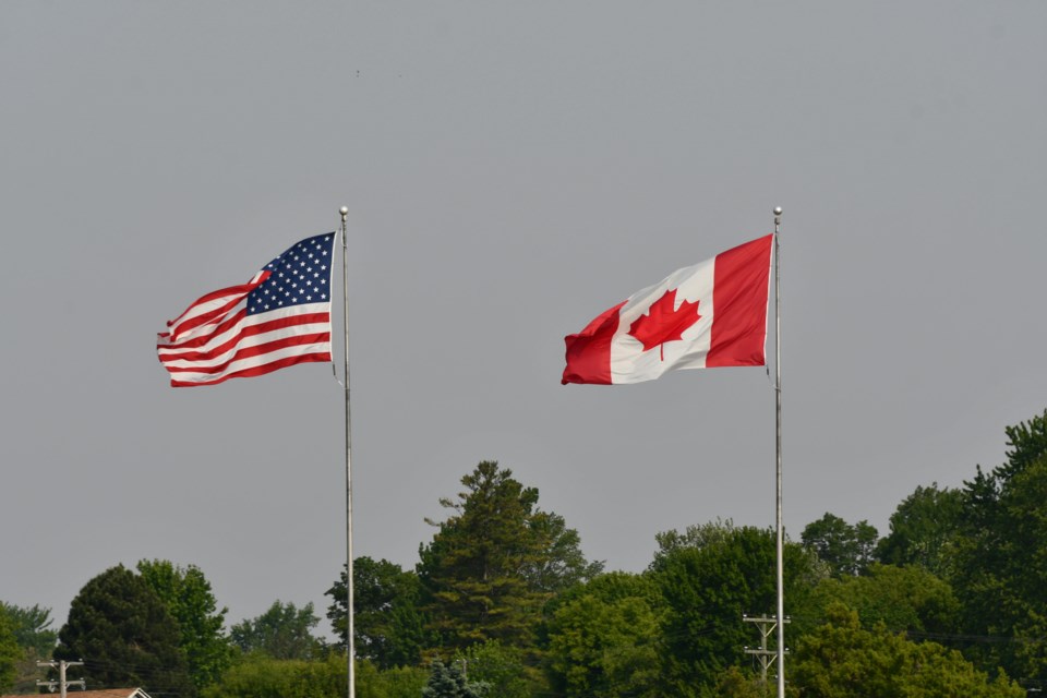 canada-us-flags-pexels-brian-forsyth