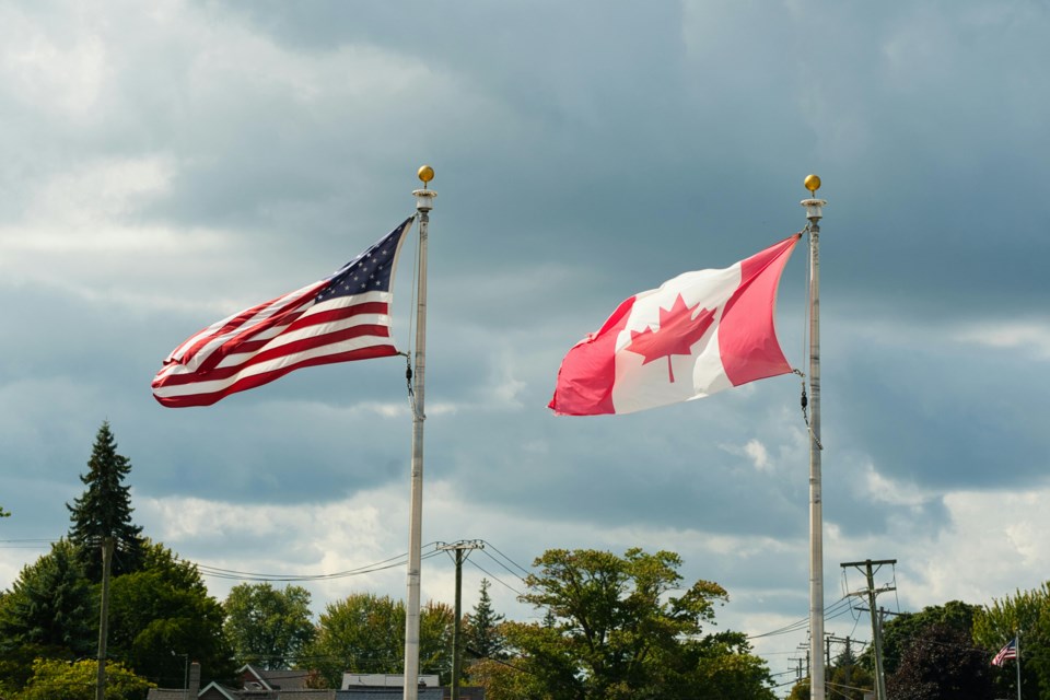 canada-us-flags-pexels-thomas-k-