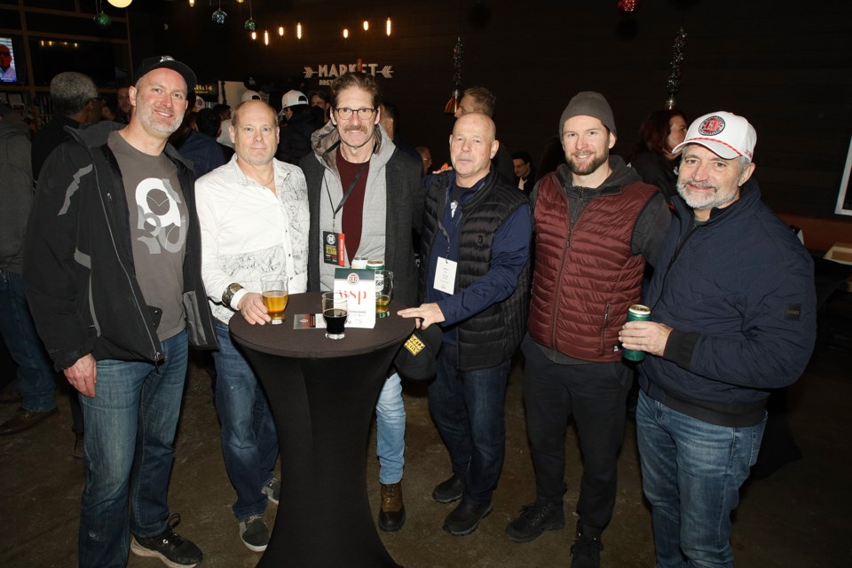 Trevor Wilson, Paul Ruytenveek, NHL Alumni Shayne Corson, Mike Smith, Tyler Wilson, and Jason Miller gather at the post-tournament celebration at Market Brewing in Newmarket for York Region's Hockey Helps the Homeless in support of Blue Door and 360kids.