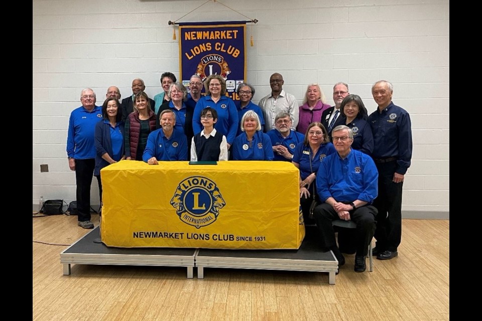 Lions club members are shown.