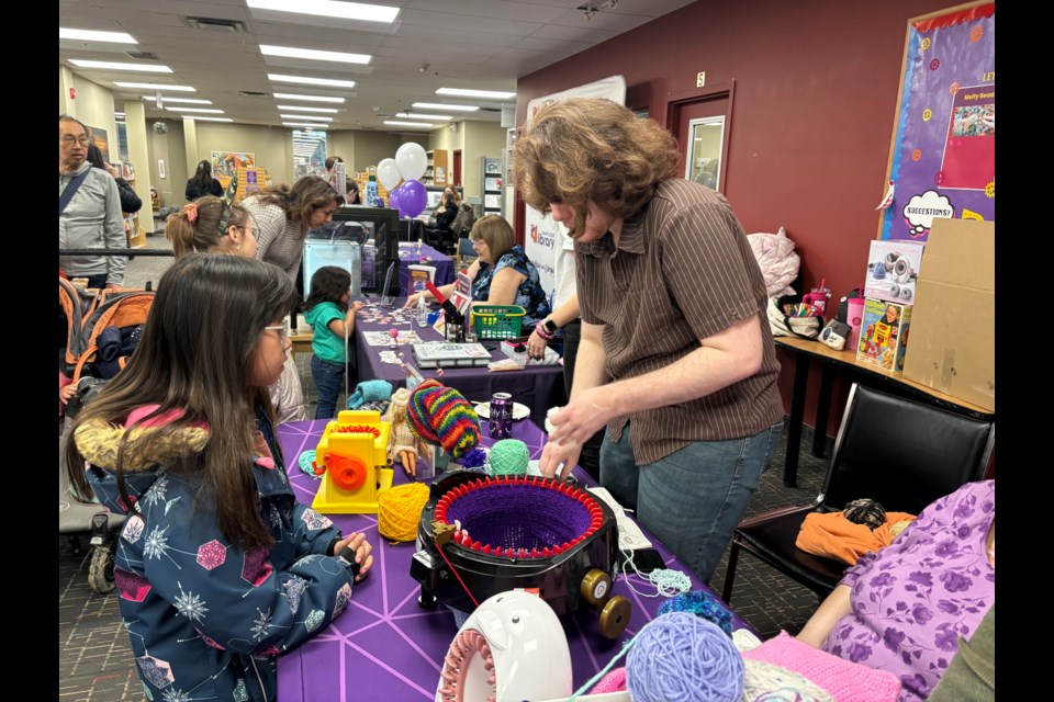 Children learn from industry experts at the Maker Hub.