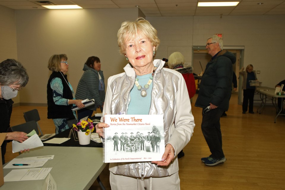 Newmarket resident Heather Burling picked up her copy at the book launch Wednesday night as part of the celebrations of the Newmarket Citizens Band's 150th anniversary.  Three generations of Burlings have been in the band.  Greg King for NewmarketToday