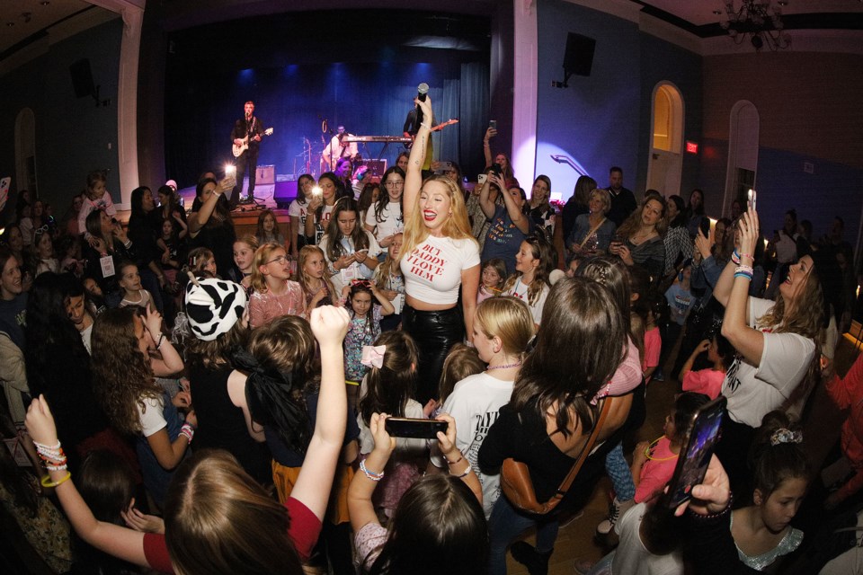 Shannon Beresford joins her Swifties in the audience at the Taylor Swift sold-out dance party hosted by the Town of Newmarket at the Old Town Hall Thursday and Friday nights.