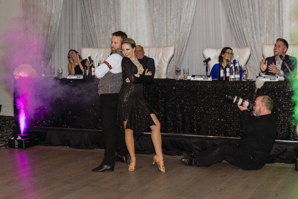 Michael Feherty, crowned best dancer, and professional dancer Anastasia Trutneva at Dancing with the Easter Seals Stars. Photography by Gary Collier