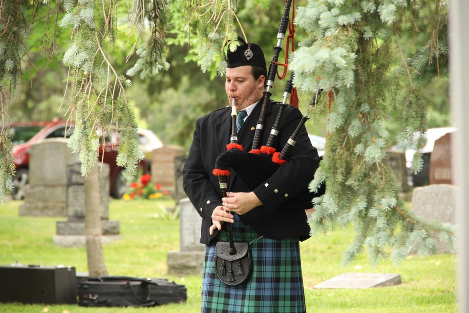 Every year since 1948, the 77 local veterans reported missing or killed in action in the Boer War, and First and Second World Wars are honoured with a special service known as Decoration Day at the Newmarket Cemetery, hosted by the Newmarket Veterans’ Association, in partnership with the Royal Canadian Legion Branch 426. Here, piper Lorne Tingle plays at the Sunday, June 11 ceremony.  Greg King for NewmarketToday