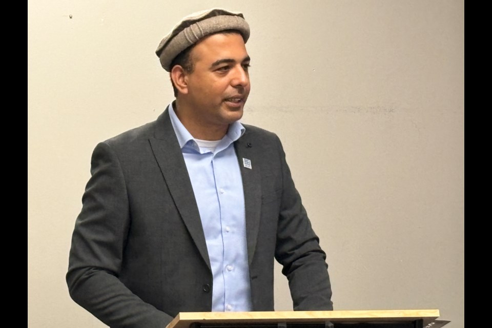 Arif Khan, chairman of the Newmarket Ahmadiyya Muslim Youth Association, addressed an audience about this year's Run for Newmarket at the launch event July 13.