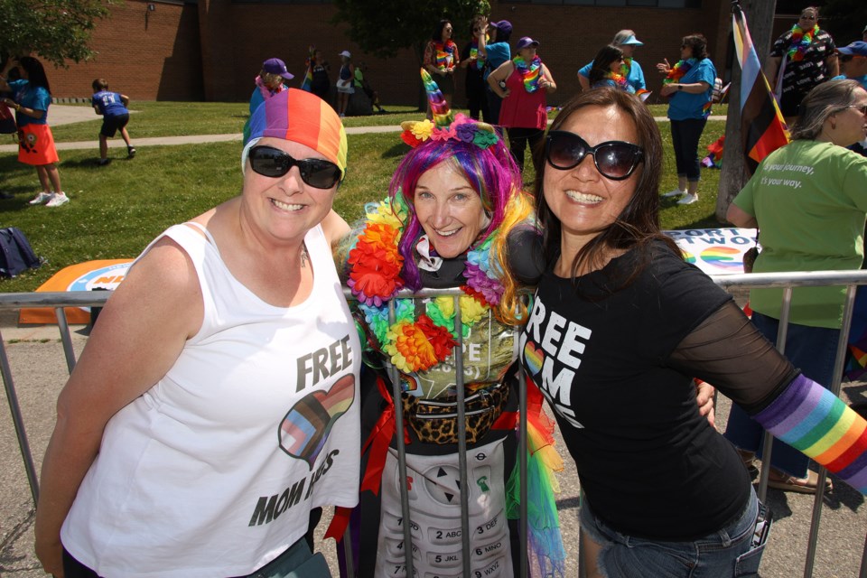 Jen Tucker, Jill Kellie, and Erica MacNeil are giving out free mom hugs at Newmarket's Pride festival.  Greg King for NewmarketToday