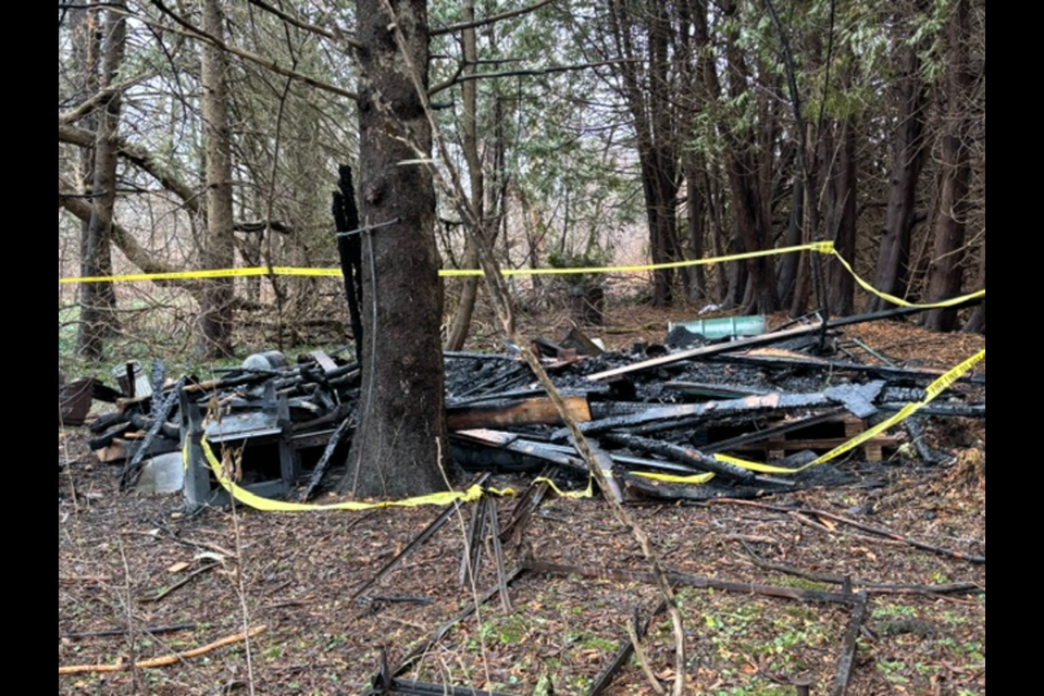 A person had built a structure and was living on the property near the vacant historic Bogart House and Bogart Pond condos. 