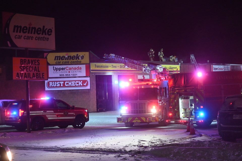 Firefighters respond to a blaze at Meineke Car Care Center Feb. 7.