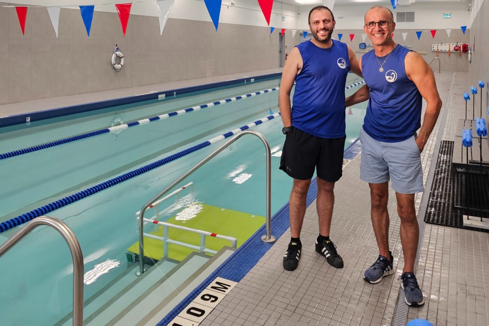 Farhad Shabani (left) and Moe Salehi will celebrate the grand opening of Swan Swim School in Newmarket on Aug. 10.