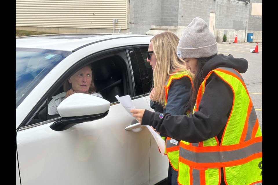 Margaret Geer (left) receives advice from occupational therapists Katherine Stubbings and Janice Huang at the CarFit event at Southlake Oct. 24.