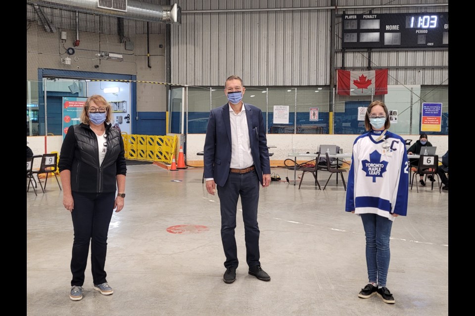 Southlake's director of community programs, Gayle Seddon, Newmarket Mayor John Taylor, and Southlake's Dr. Charmaine van Schaik at the vaccination clinic. 