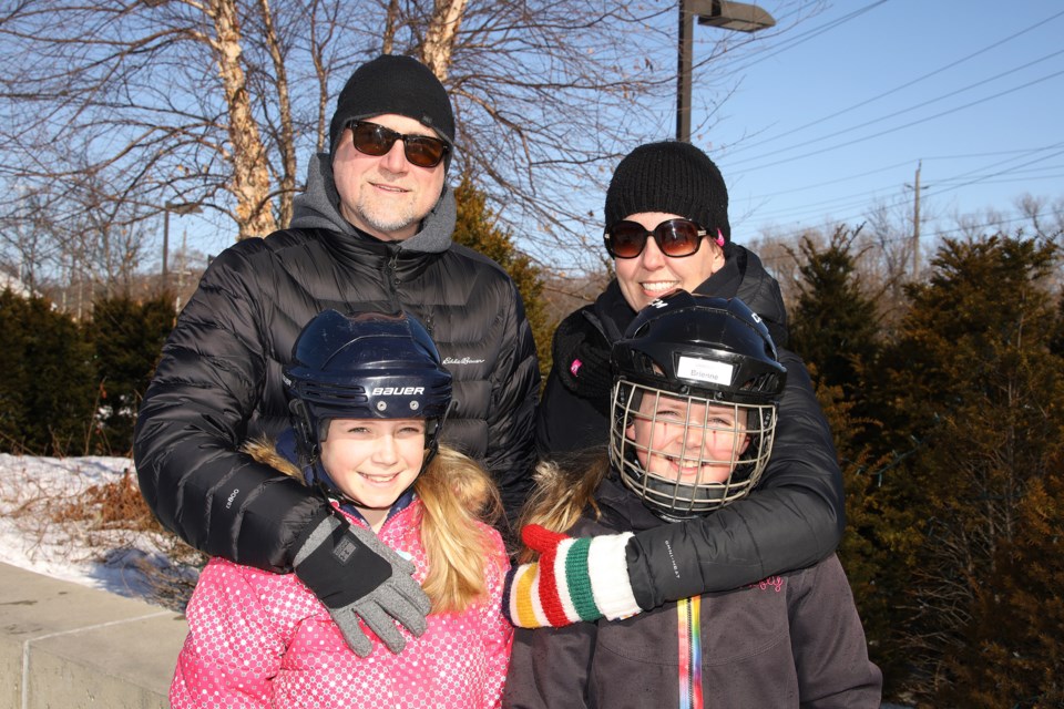 Duncan and Cathy Prescott with daughters Ashtyn and Brienne enjoy a Family Day skate at Riverwalk Commons Feb. 17.  Greg King for NewmarketToday