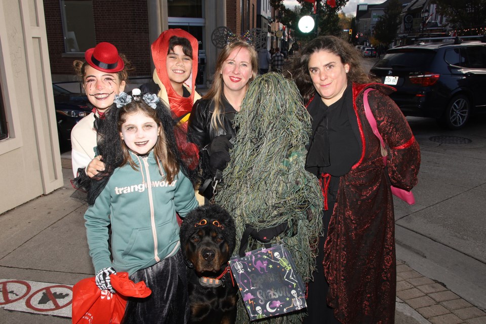 Daniella, Martina, Diego, Melissa, Maria, Holden (in the ghillie suit), and Rollo the dog-spider.