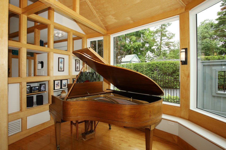 An antique grand piano is the focal point of the solarium at renowned historical property, The Sutherland House, in Newmarket. It's one of six homes and gardens on the CUFW tour today, June 9, in support of scholarships for young women.