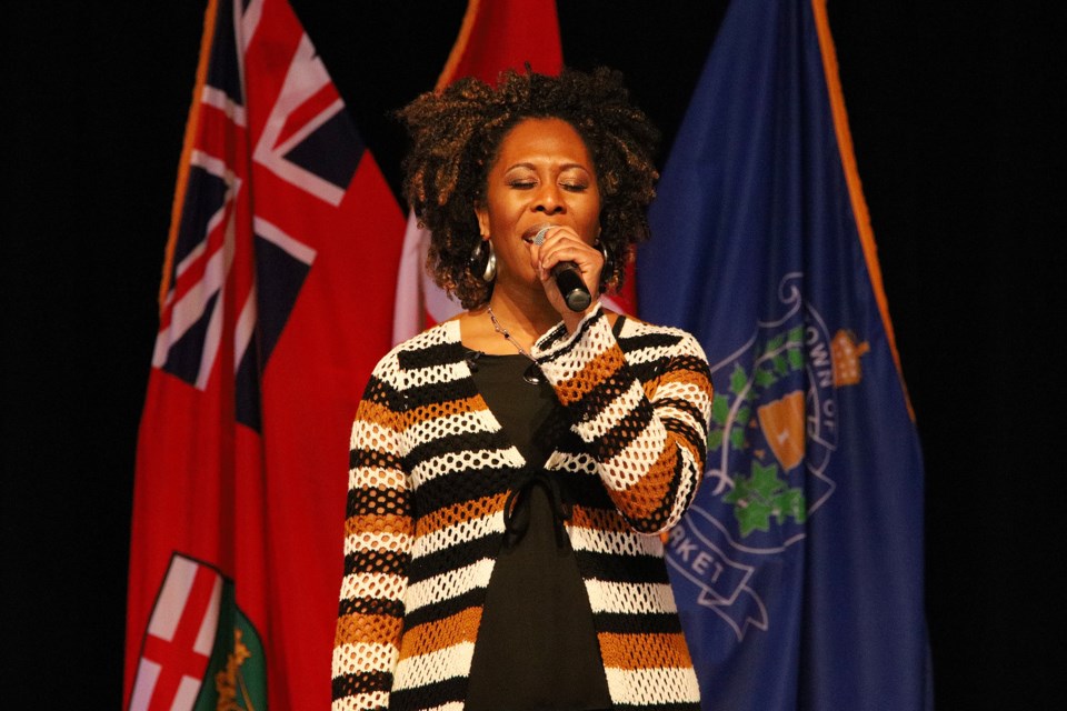Quisha Wint sings the national and Black anthems at the Black History Month event presented by the Newmarket African Caribbean Canadian Association (NACCA) and the Town of Newmarket Feb. 8.  Greg King for NewmarketToday