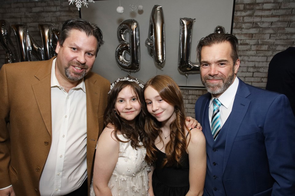 Scott Day with daughter Portia and Ryan Whitehead with Kacey are all dressed up for the inaugural Snow Ball, a heartwarming dance to celebrate the special bond between fathers and daughters while supporting the mission of Girls Inc. of York Region Friday night at EventMrkt in Newmarket.