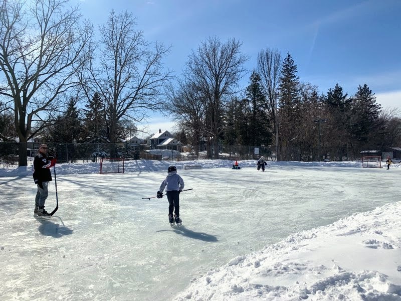 William Chase, 9, (centre, foreground) learned to play hockey at the Newmarket Lions Park community hockey rink. Supplied photo