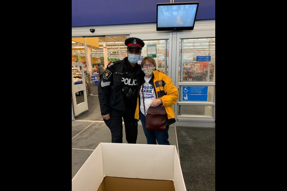 Susan Horne and YRP Officer Gary Sangha.