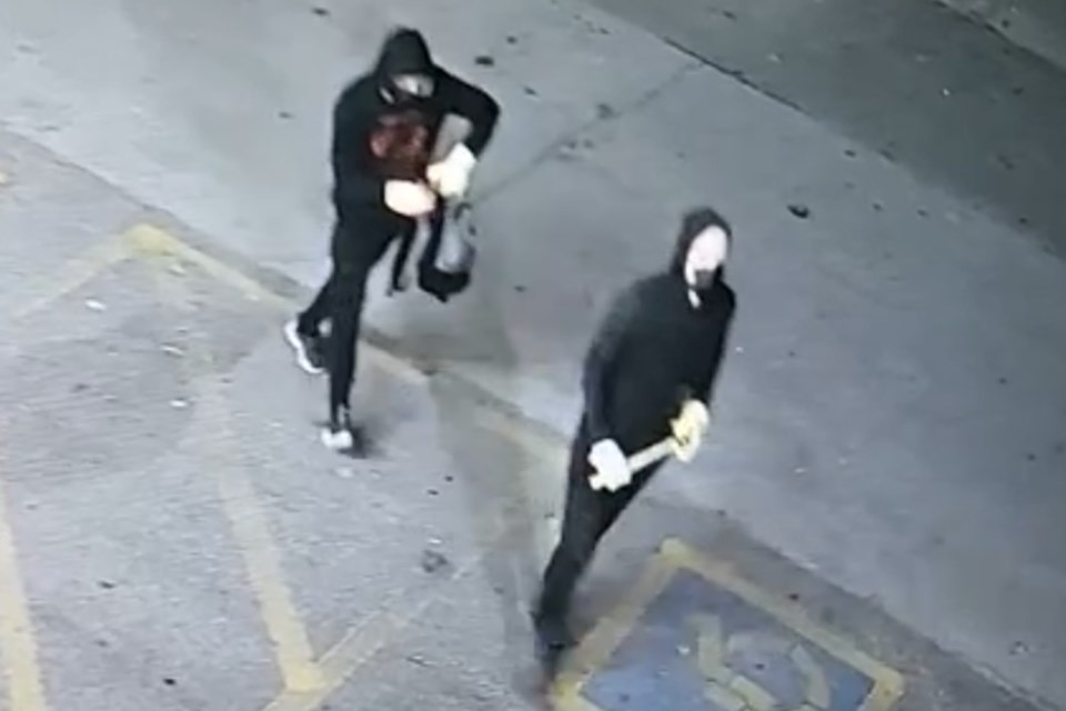 Police are looking to identify these two suspects in connection with an arson.