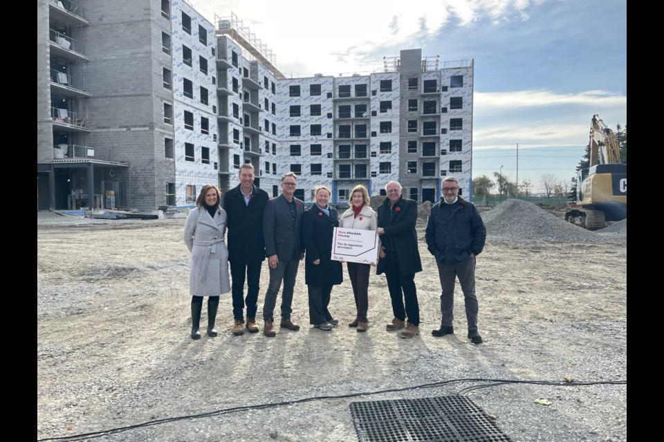 Dignitaries gather at an affordable housing project in Stouffville for a federal funding announcement, including (from left) York Region general manager of housing services Karen Antonio-Hadcock, Newmarket Mayor John Taylor, Whitchurch-Stouffville Mayor Iain Lovatt, York Region community and health services commissioner Katherine Chislett,  Markham-Stouffville MP Helena Jaczek, Newmarket-Aurora MP Tony Van Bynen, and Ontario Minister of Municipal Affairs and Housing  Paul Calandra.