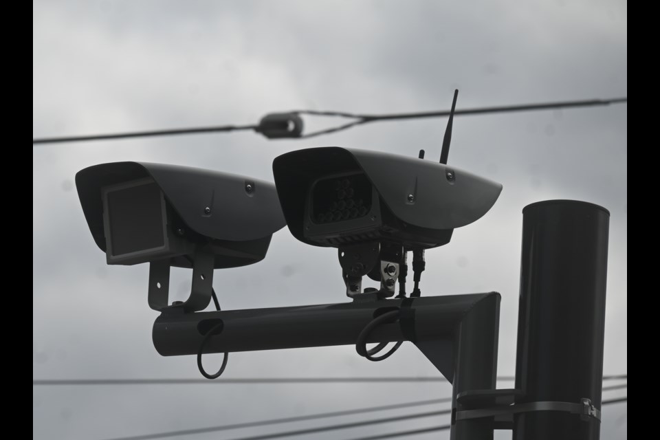 Pole-mounted speed cameras on Queen Street outside of J.L.R. Public School.