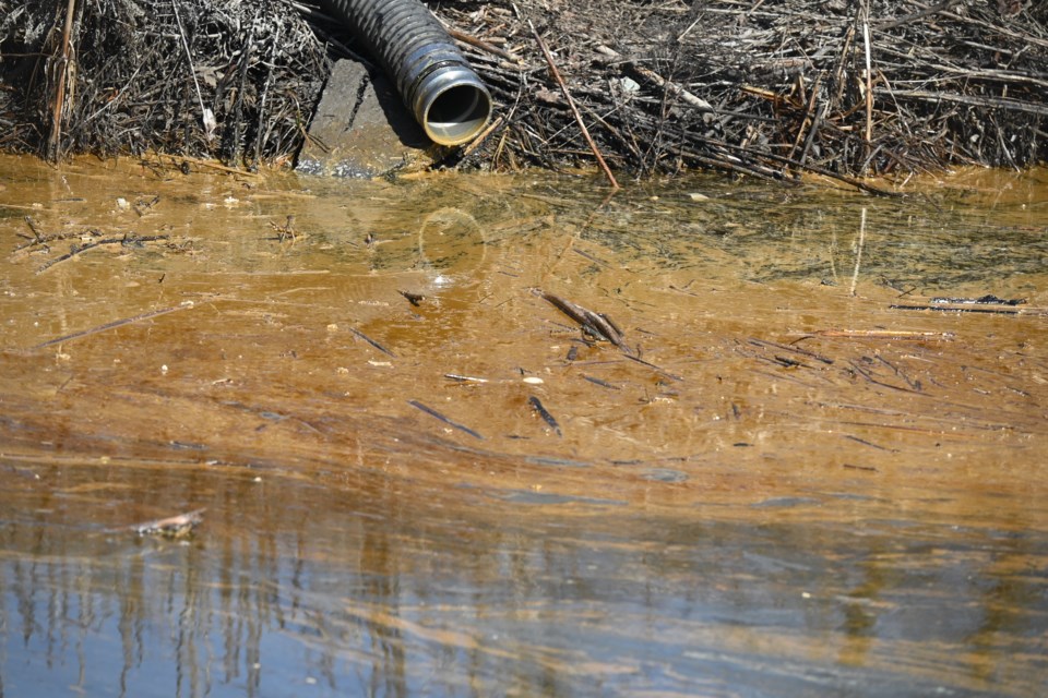 A spillage into the water off Cane Parkway.