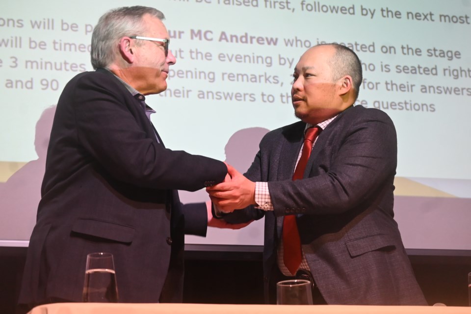 Newmarket-Aurora candidates Chris Ballard (Liberal) and Denis Heng (NDP) are shown after a candidates event Feb. 12.