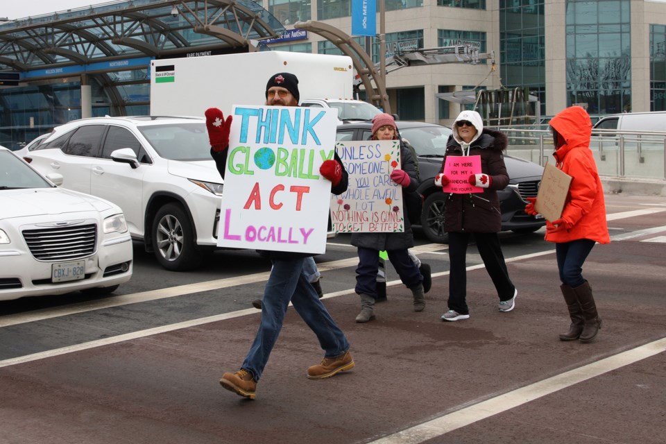 Bradford resident Mike Walsh joins the Newmarket march for climate justice organized by Fridays for the Future Newmarket-Aurora.  Greg King for NewmarketToday