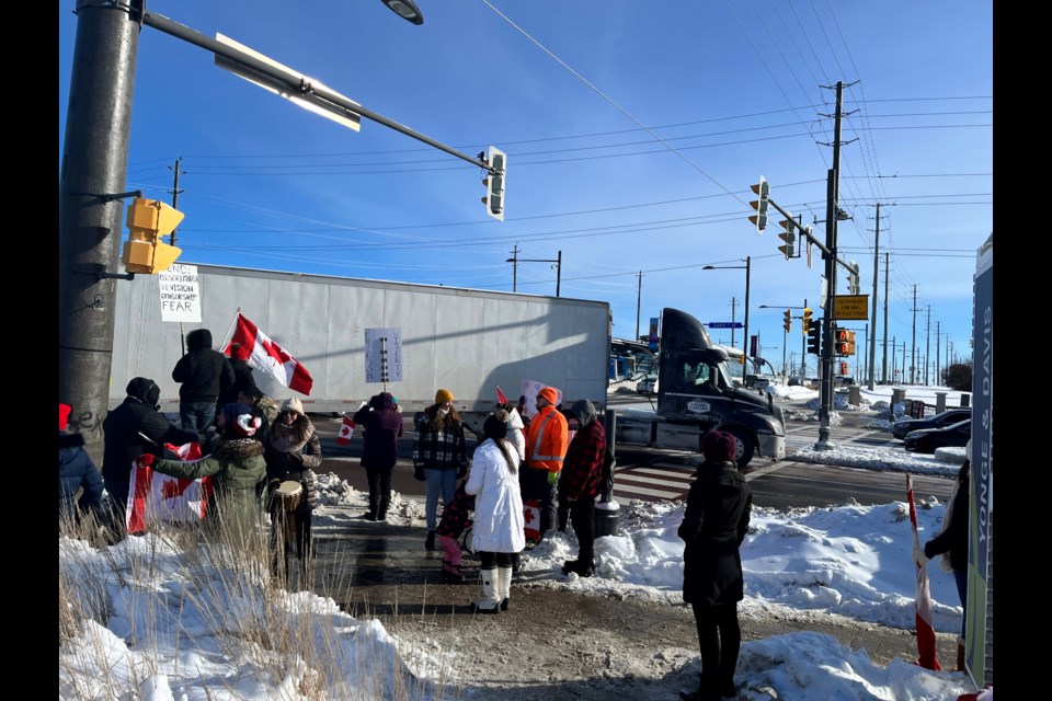 Protesters declare that Freedom Is Essential at the March for Freedom  in Toronto, ON, aimed at ending COVID-19 restrictions Stock Photo - Alamy