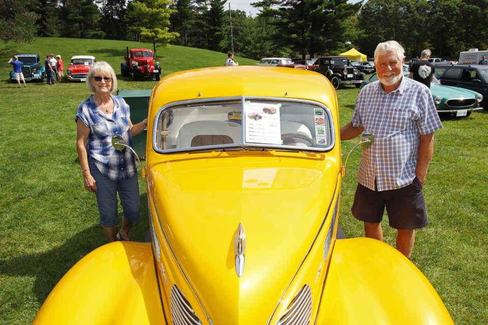 Deb and Rick Huskisson bring their 1938 Ford Deluxe Coupe to Newmarket Car Club's annual show at Fairy Lake Park Saturday.