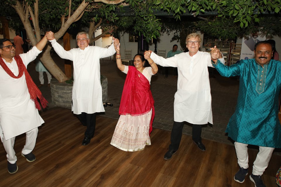 Newmarket Councillor Bob Kwapis and Deputy Mayor Tom Vegh join the festivities for Navratri and Janmashtami at Madison Greenhouse in Newmarket Sunday.