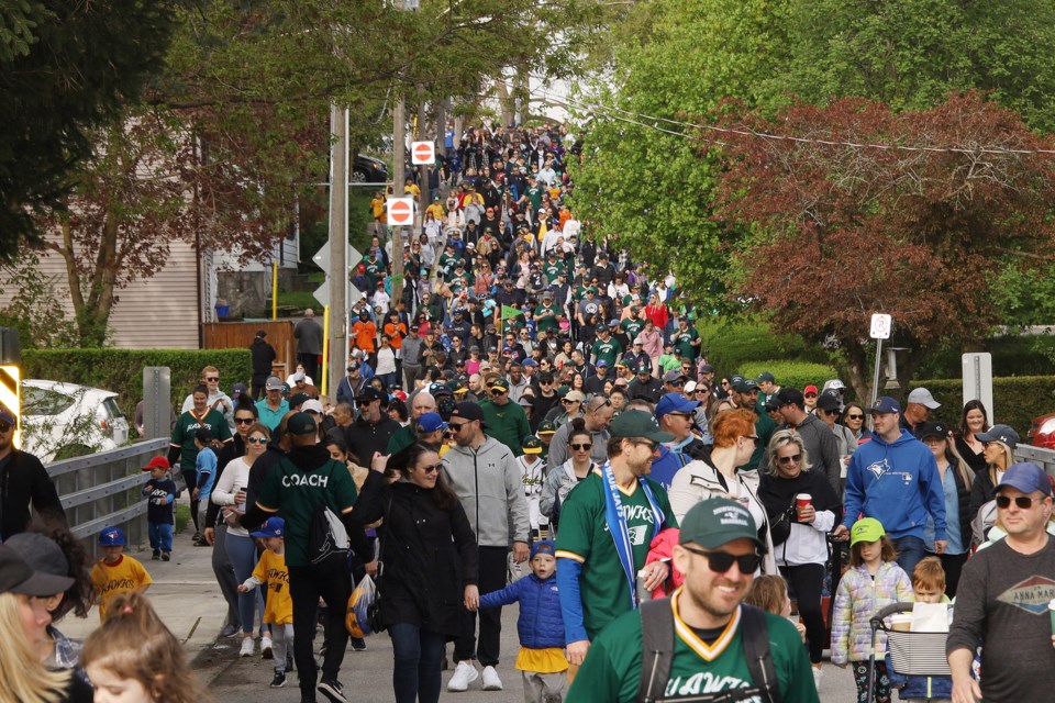 Timothy Street was filled with players and their families Saturday for the parade that kicks off the season for the Newmarket Baseball Association.