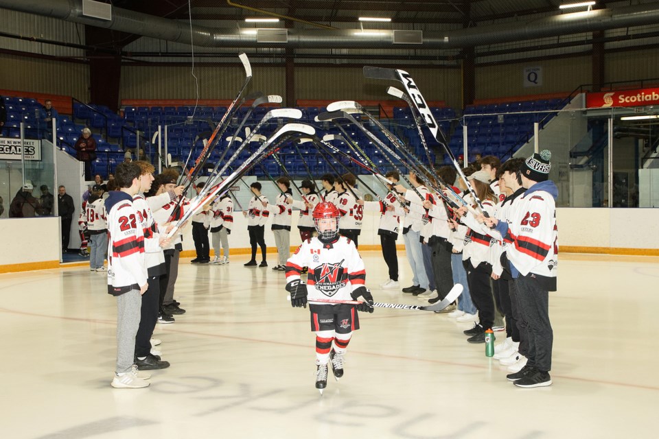 The Newmarket Renegades' U9s marked a rite of passage, playing on full ice for the first time Saturday, in a game against the Orillia Terriers at Ray Twinney Complex. The team skated onto the ice through an arch formed by Newmarket's U18 team.