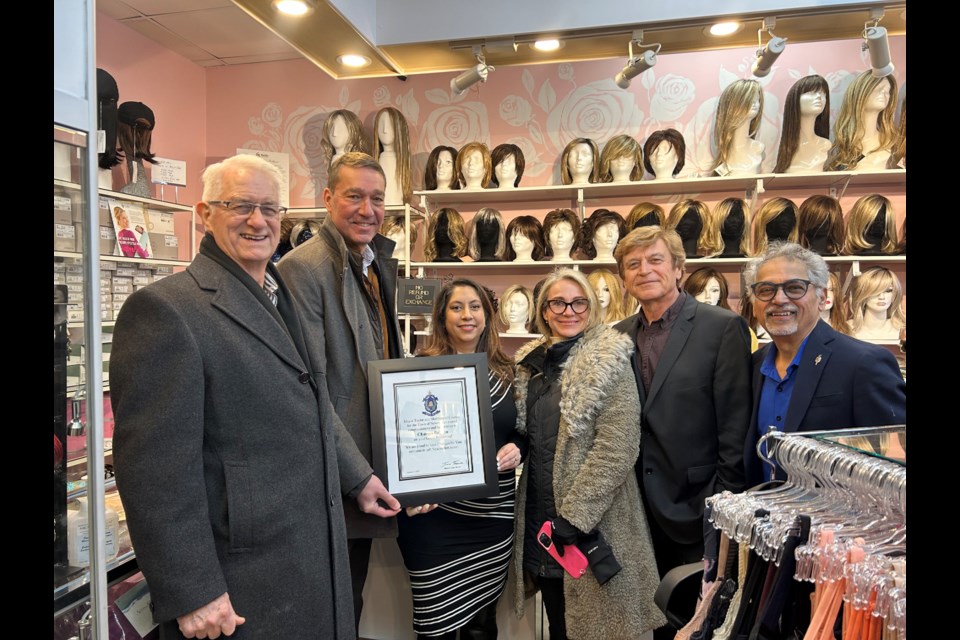 Ward 2 Councillor Victor Woodhouse (from left), Mayor John Taylor, employee Leigh-Ann Rodrigo, Ward 1 Councillor Grace Simon, Deputy Mayor Tom Vegh and Changes For You director Rory Rodrigo with a celebratory plaque at the new location.