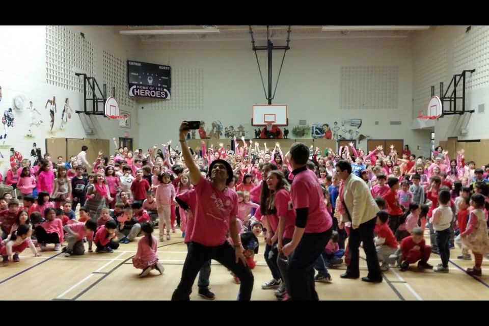 The packed gymnasium at 
Hartman Public School in Aurora during a past Pink Shirt Day assembly. 
