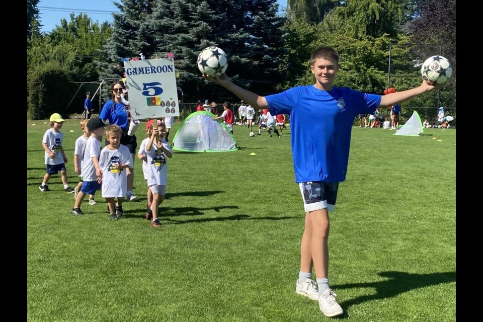 Summer fun: About 330 kids, dozens of police officers and many community volunteers (including past attendees) made the return of the New Westminster Police Department’s summer soccer school a success. photo Theresa McManus 