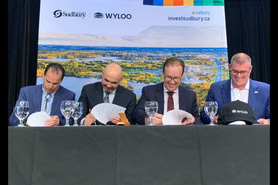 (l-r) Wahnapitae Chief Larry Roque,  Atikameksheng Anishnawbek Gimaa Craig Nootchtai, Greater Sudbury Mayor Paul Lefebvre and Wyloo Canada CEO Kristan Straub sign an MOU for a future battery metals processing plant.