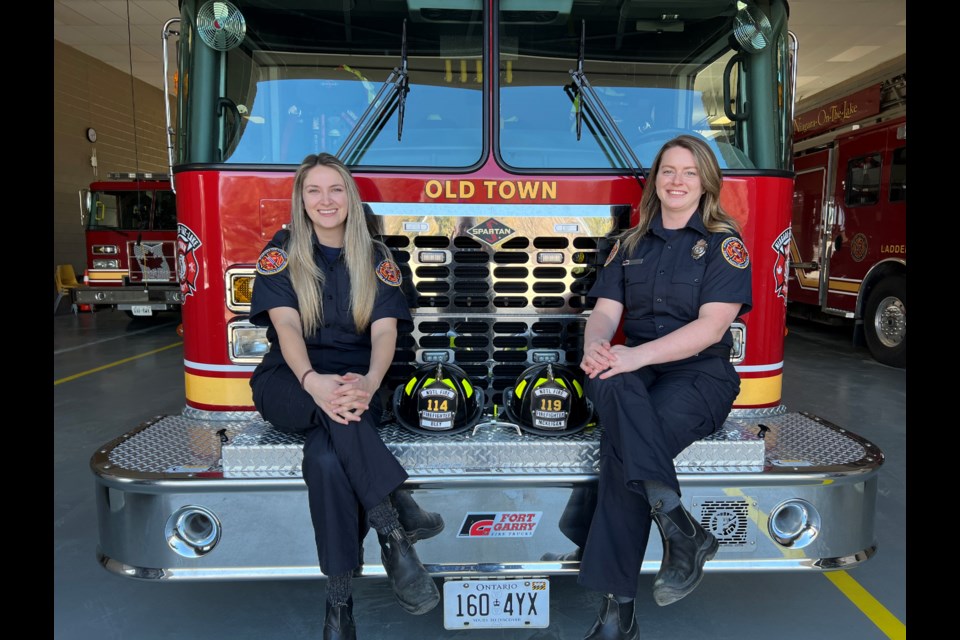 Danielle Bley and Karley McKeigan, volunteer firefighters, love the idea of Camp Molly to encourage young women to think of firefighting in their future. 