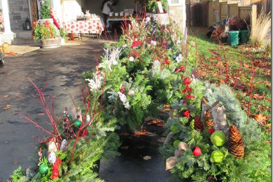 Tanya Rice's Line 2 driveway and some of the planters that were for sale last weekend.