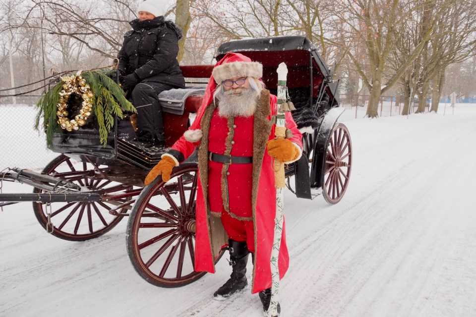 Dave Bennison provides historic tours of NOTL with Vineyard to Village carriages, combining stories about the town and about Santa.