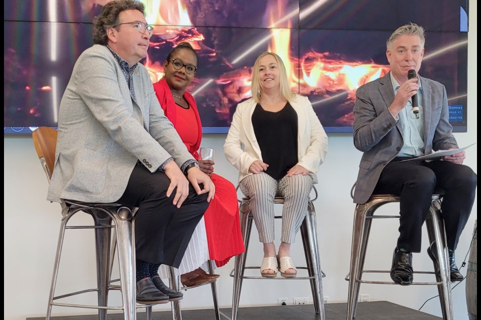 Lord Mayor Gary Zalepa, Chamber president and CEO Minerva Ward, town CAO Marnie Cluckie and Paul MacIntyre of Lais Hotels, during a fireside chat at the business forum.