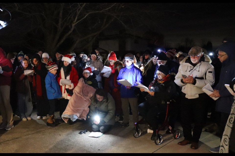 As many as 200 people showed up at the Dyck family's Cherry St. home in Virgil. 