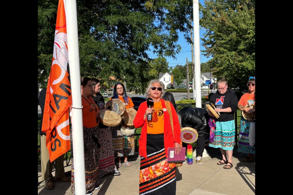 Elder Mary Clause asks us to remember "those native children who are not with us today."