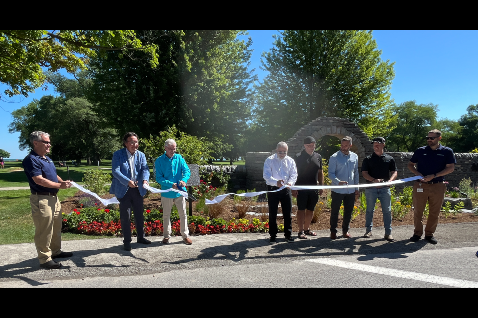 Cutting the ribbon L-R: J.B. Hopkins, Lord Mayor Gary Zalepa, Gerry Kowalchuk, Haig Sefarian, Brad Smith, Chris Hopkins, Kevin Turcotte